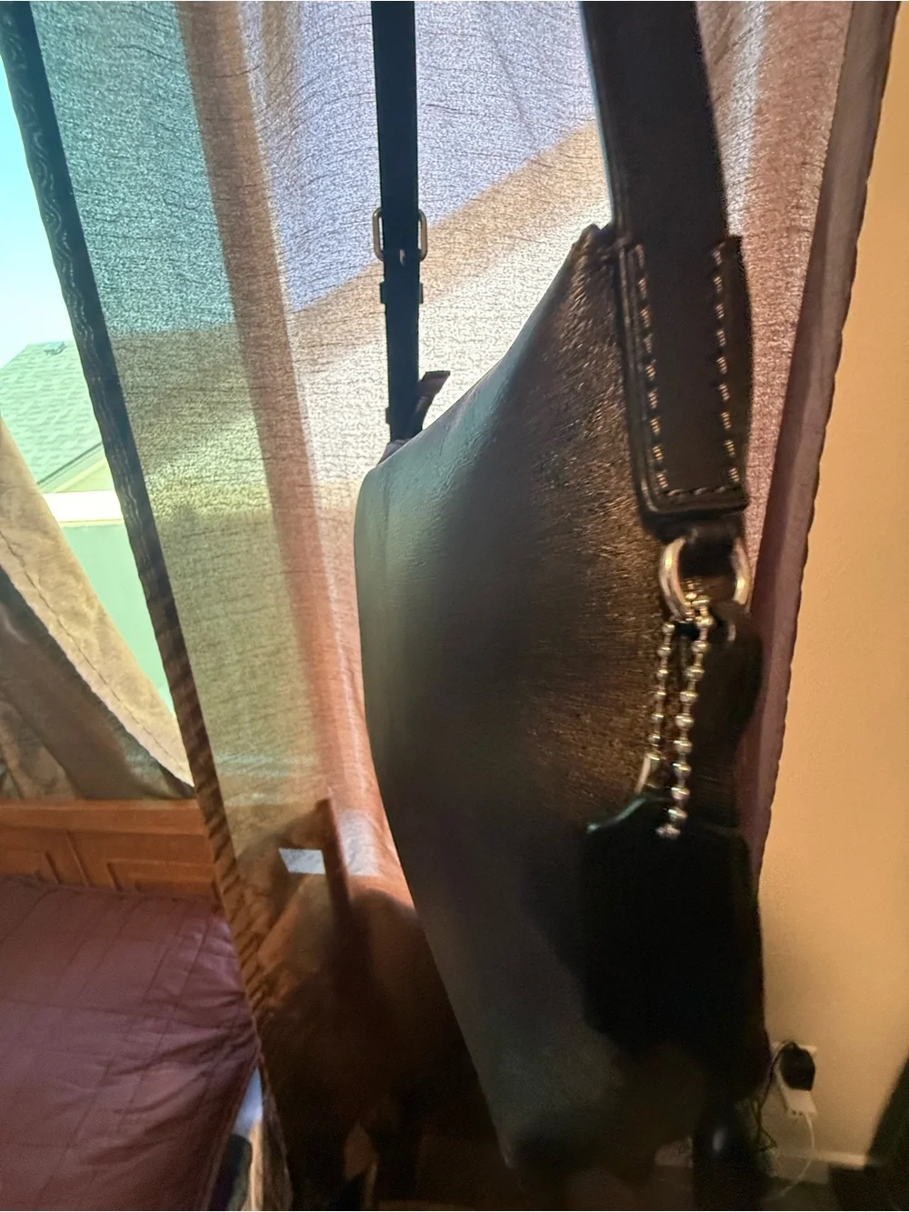 Coach sleek black